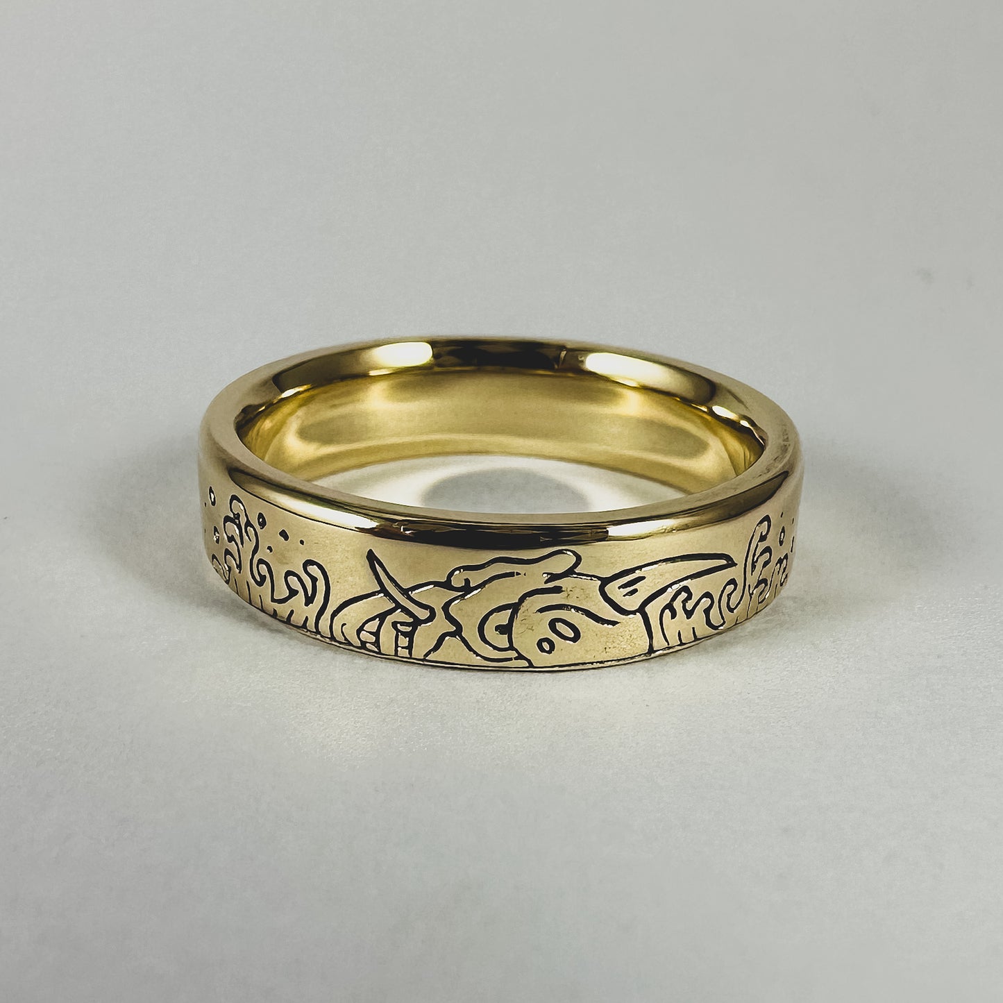 ONI II - 9ct. Gold